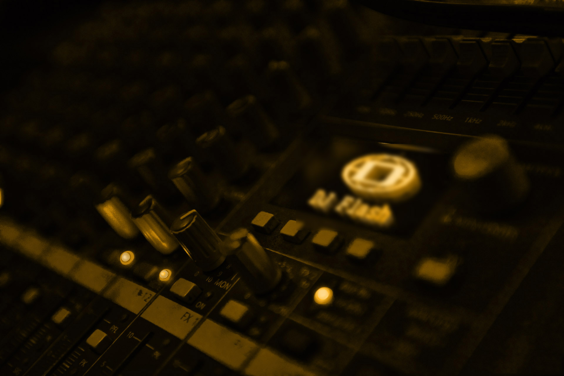 DJ decks lit in amber at a Bolton wedding reception