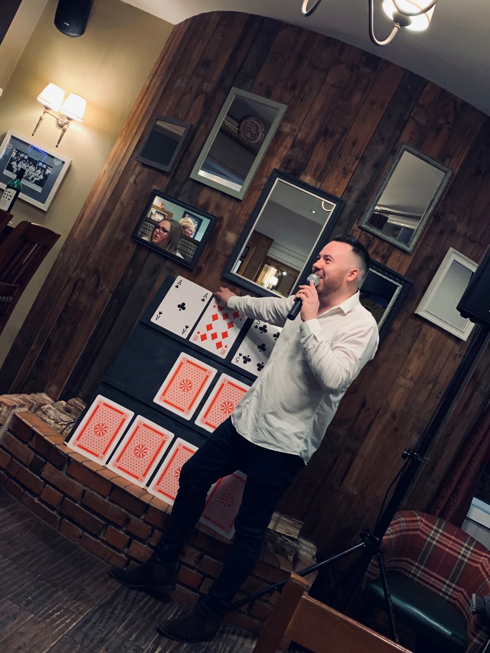 Andy hosting an interactive Play Your Cards Right game